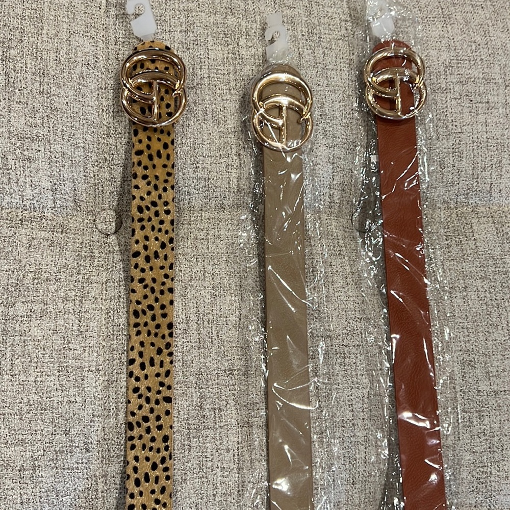 3 belts. 1 leopard, 1 taupe, 1 brown.  One size. All new! $40. for all!